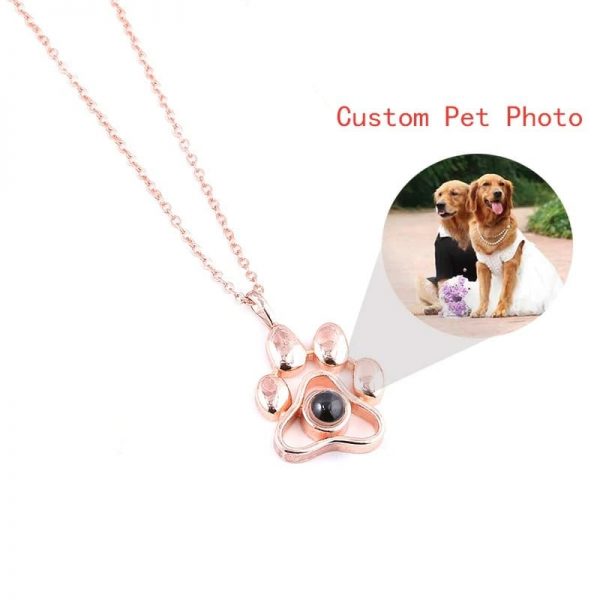 two dogs and a paw necklace