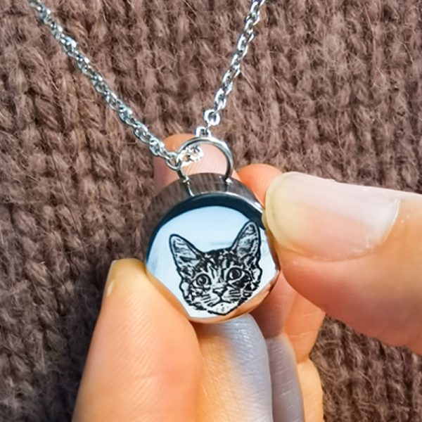 a silver cat pet urn necklace