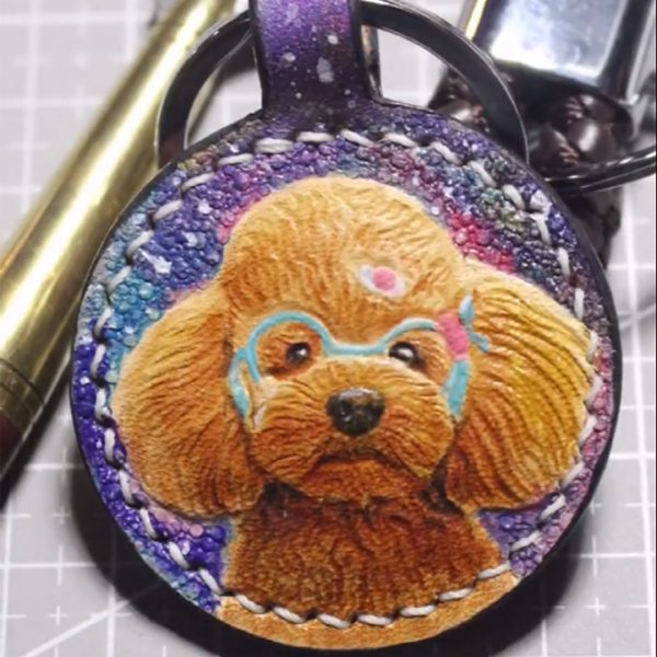 a red-brown Teddy dog glaxy keychain