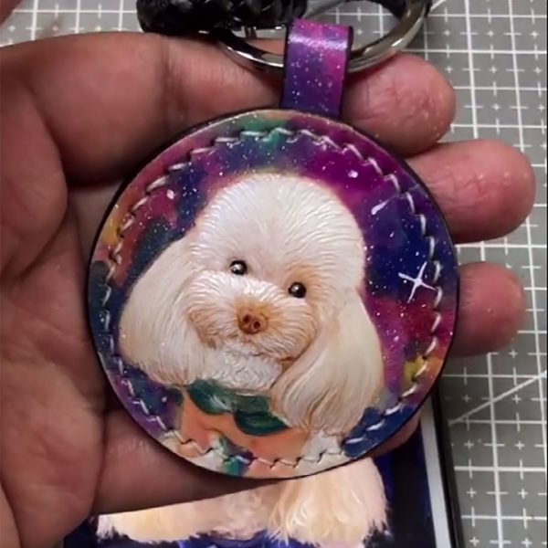 a white Teddy dog glaxy keychain